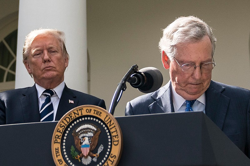 Senate Majority Leader Mitch McConnell (R-Ky.) speaks with President Donald Trump in the Rose Garden after a meeting at the White House on Monday, Oct. 16, 2017. MUST CREDIT: Washington Post photo by Jabin Botsford.
