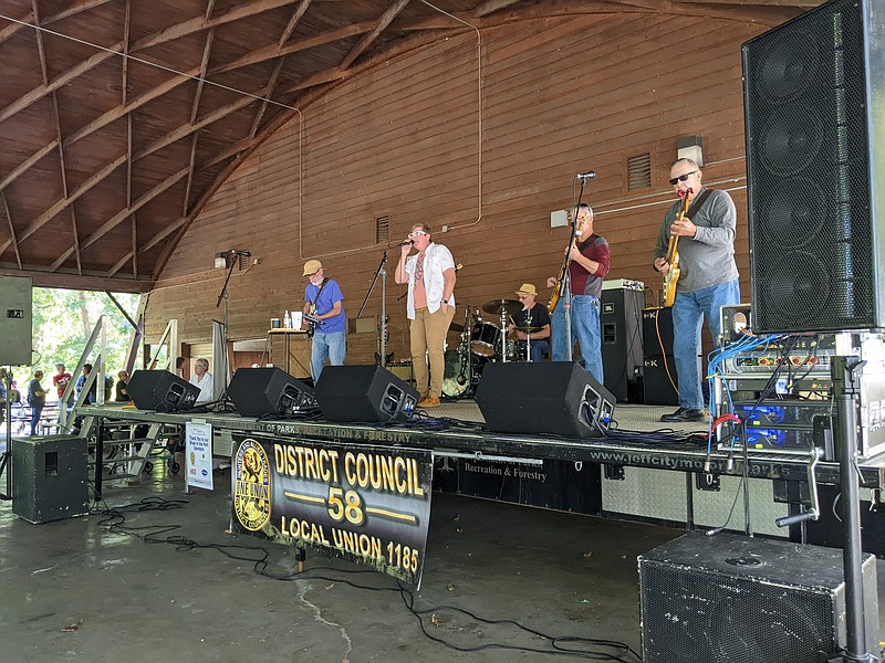Ryan Pivoney/News Tribune photo: 
Luke Blue and the Pla-Mors were among three local bands to perform Sunday at Blues in the Park. Megan Boyer, who sang with the band, said it was her first performance since the COVID-19 pandemic started roughly three years ago.