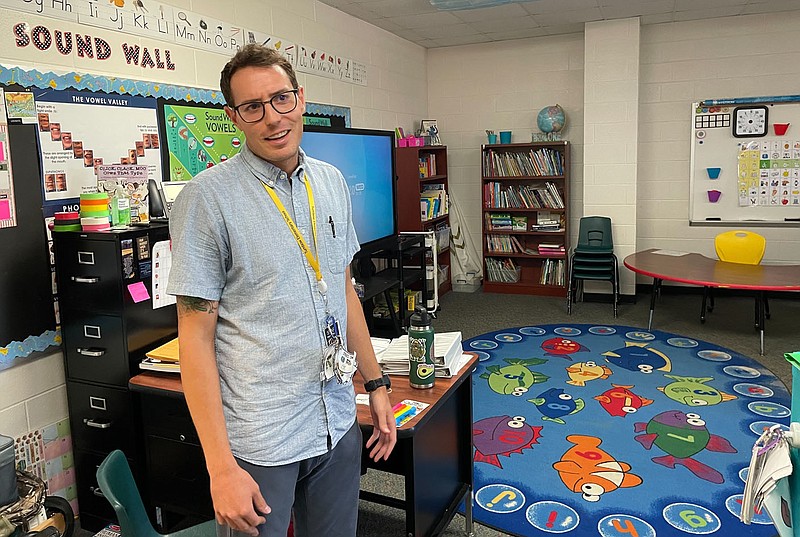 Cameron Thomas, seen here in his special education classroom Wednesday at Springdale's Turnbow Elementary School, ran in the Arkansas Traveller 100 on Saturday and Sunday, and in doing so raised money for Autism Speaks, an autism advocacy organization.
(NWA Democrat-Gazette/Dave Perozek)