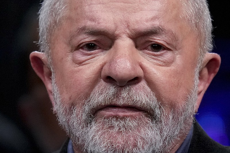 Former Brazilian President Luiz Inacio Lula da Silva, who is running for president again, speaks to supporters after general election polls closed in in Sao Paulo, Brazil, Sunday, Oct. 2, 2022. (AP Photo/Andre Penner)