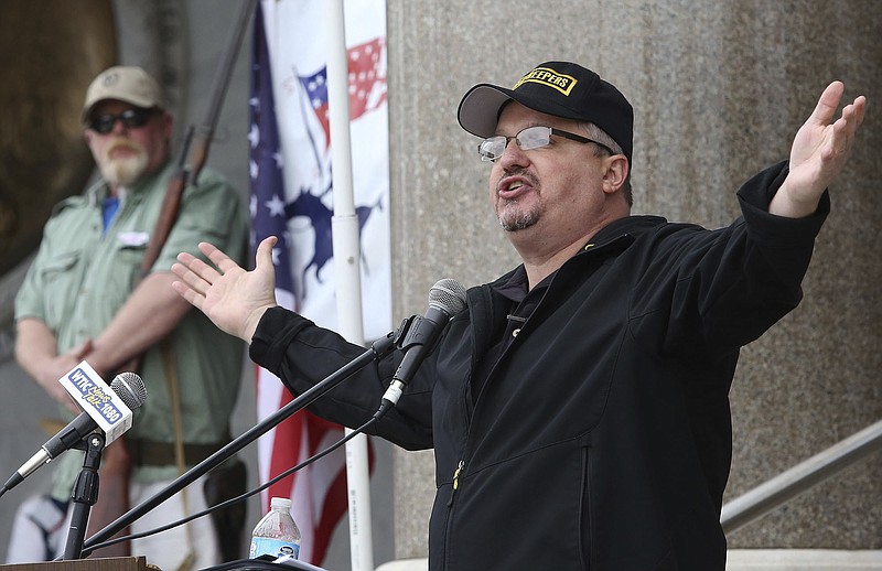 FILE - Stewart Rhodes, the founder of Oath Keepers, speaks during a gun rights rally at the Connecticut State Capitol in Hartford, Conn., April 20, 2013. Federal prosecutors are preparing to lay out their case against the founder of the Oath Keepers&#x2019; extremist group and four associates. They are charged in the most serious case to reach trial yet in the Jan. 6, 2021, U.S. Capitol attack. Opening statements are expected Monday in Washington&#x2019;s federal court in the trial of Stewart Rhodes and others charged with seditious conspiracy. (Jared Ramsdell/Journal Inquirer via AP)