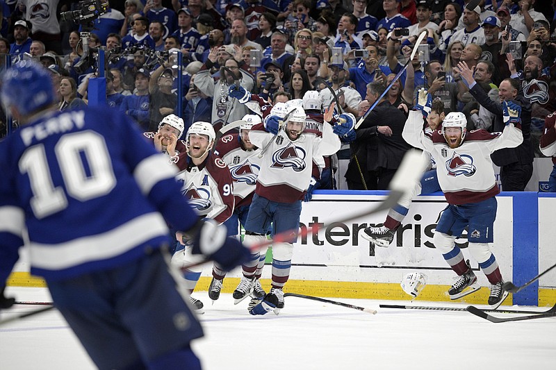The Colorado Avalanche celebrate winning the Stanley Cup against the Tampa Bay Lightning in Game 6 of the NHL hockey Stanley Cup Finals on June 26, in Tampa, Fla. Thanks to an unprecedented level of skill and speed on the ice, business is booming going into what's expected to be the league's first full season on a normal schedule since before the pandemic. - Photo by Phelan Ebenhack of The Associated Press