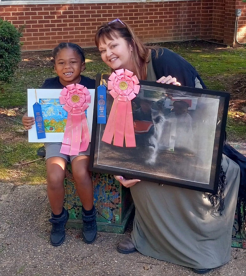 Kindergartener Keisyn White won Best of Show at the Miller County Fair competition by using toilet paper rolls and straws to make a tempera print. Fairview art teacher Dr. Elisabeth Eaton also submitted her art and received $250 awarded by the MCFA. She will use the funds to support the school's art program. (Submitted photo)