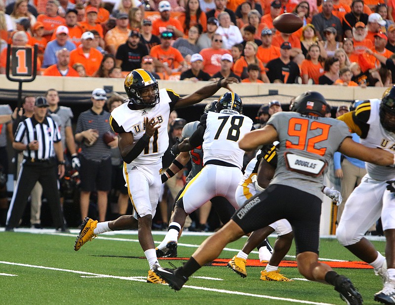 UAPB quarterback Skyler Perry fires a pass against Oklahoma State in a Sept. 17 game in Stillwater, Okla. (Special to The Commercial/Michael Sudhalter)