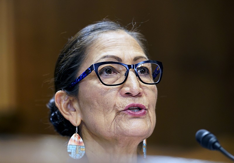 FILE - Interior Secretary Deb Haaland speaks during a Senate Energy and Natural Resources Committee hearing on May 19, 2022, on Capitol Hill in Washington.  The U.S. Interior Department has launched a set of new policies that would require thousands of law enforcement officers to wear body cameras, ensures the release of footage in some critical incidents and restricts the use of so-called no-knock warrants. The announcement Monday comes after Interior Secretary Deb Haaland launched a task force last year aimed at further building trust between law enforcement and the public. (AP Photo/Mariam Zuhaib, File)