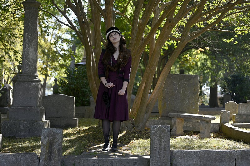 Beatrice Robinson, 15, practices a monologue as Hazel Wilson Burr during rehearsal for “Tales of the Crypt” at Mount Holly Cemetery on Tuesday. (Arkansas Democrat-Gazette/Stephen Swofford)