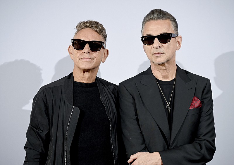 Musicians Martin Gore (left) and Dave Gahan of the British band Depeche Mode pose for photos in Berlin on Tuesday. They announced that a new album and tour are coming in 2023, despite the recent death of founding member Andy Fletcher. (dpa via AP/Britta Pedersen)