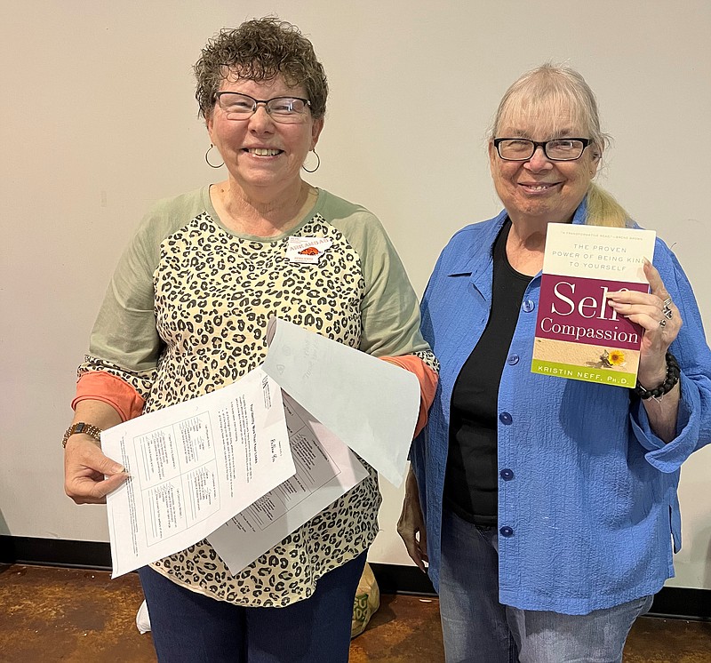 Brenda Hendrix (left) and Patsy Brown present the program at the Heart-N-Hands Extension Homemakers Club meeting. (Special to The Commercial)