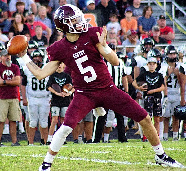 PREP FOOTBALL Bell focused on his job at quarterback while piling up