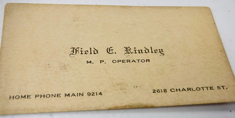 Westside Eagle Observer/SUSAN HOLLAND
A business card belonging to World War I air ace Field Kindley is displayed at the Gravette Kiwanis Club meeting Friday morning, Oct. 7. The card, a recent acquisition of the Gravette historical museum, shows that Kindley was a "M.P. Operator" and was apparently printed at the time he was showing movies on a vacant lot in Gravette as a teenager. It is estimated to date from 1912 or 1913.