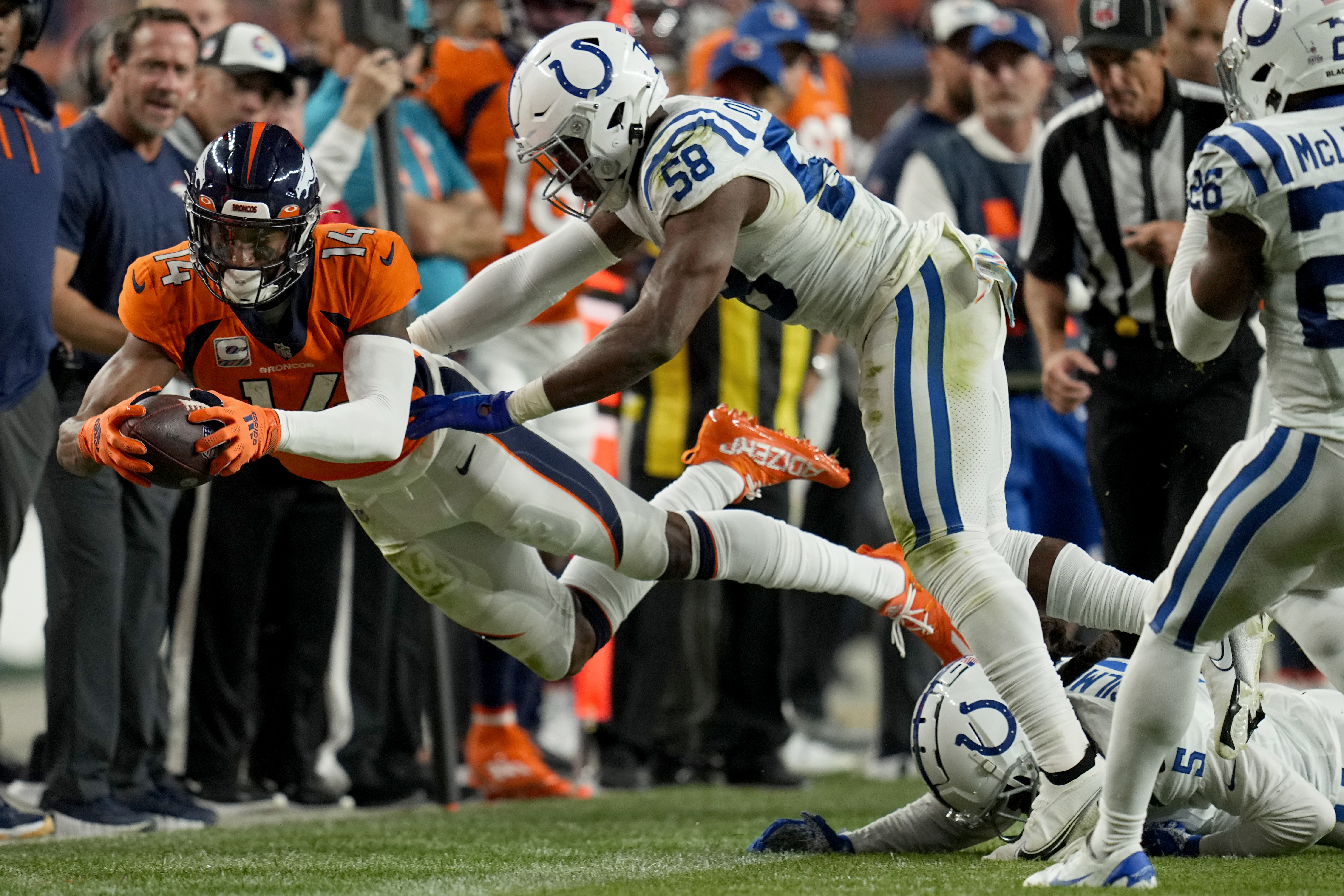 Denver Broncos safety Caden Sterns (30) leaves the field after an NFL  football game against the Indianapolis Colts, Thursday, Oct. 6, 2022, in  Denver. The Colts defeated the Broncos 12-9 in overtime. (