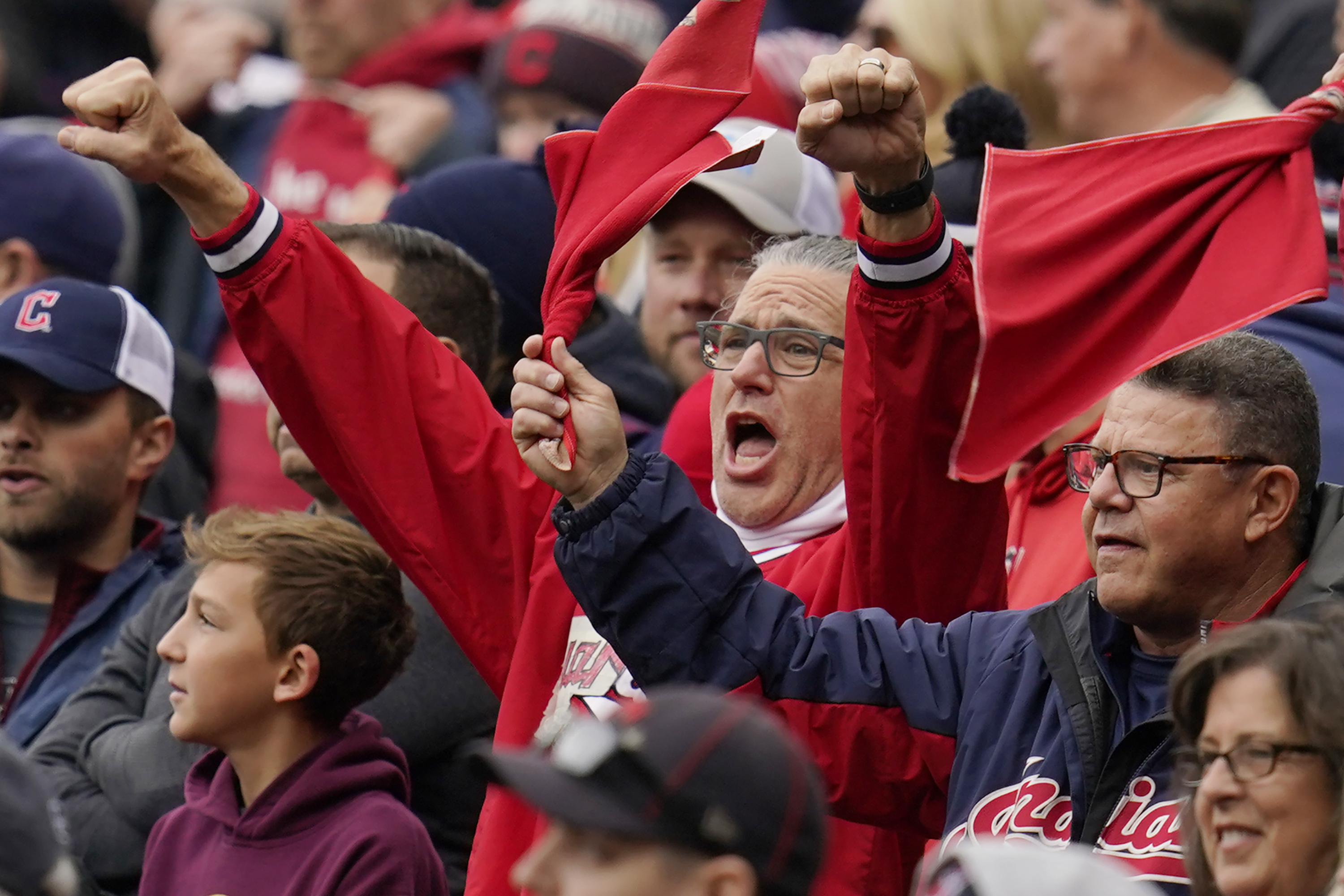 Cleveland Guardians fans cheer before a wild card baseball playoff
