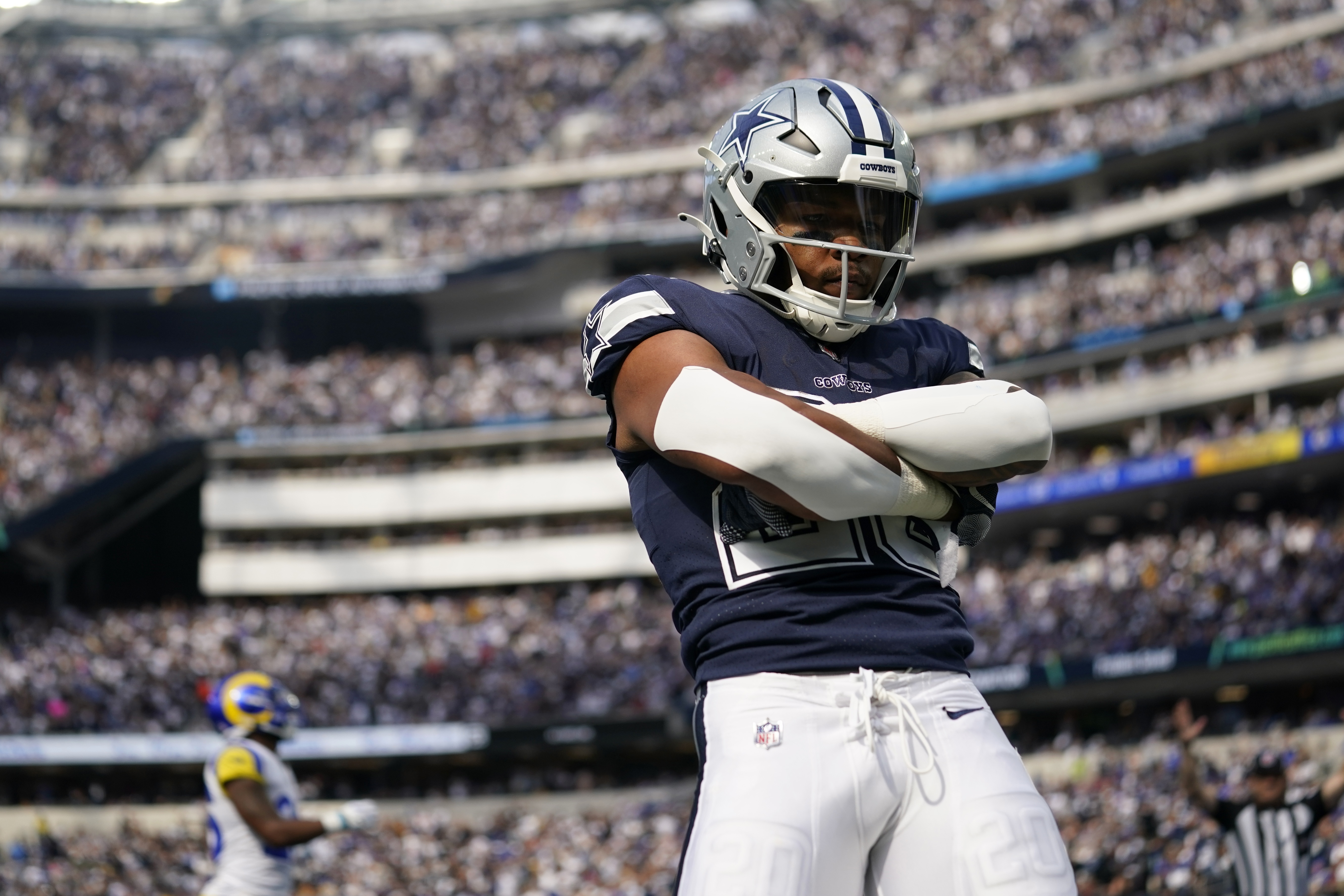 Running back (23) Rico Dowdle of the Dallas Cowboys warms up before playing  against the Los Angeles Rams in an NFL football game, Sunday, Oct. 9, 2022,  in Inglewood, Calif. Cowboys won