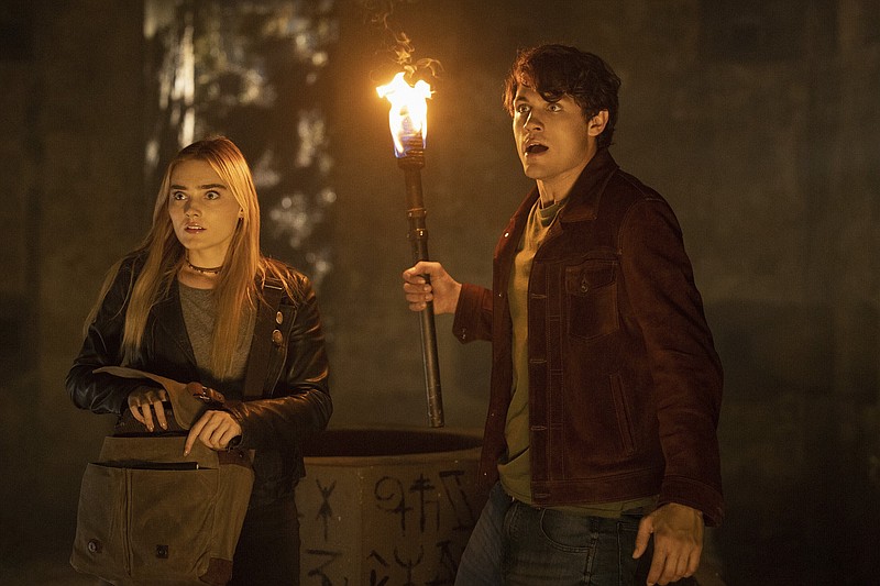 Meg Donnelly (left) and Drake Rodger star in “The Winchesters,” a prequel to the long-running CW series “Supernatural.” (The CW via AP/Matt Miller)