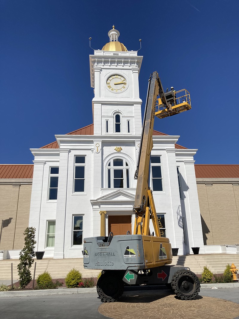 Voters can cast their ballots starting Oct. 24, when early voting starts at the Jefferson County Courthouse. Here, workers power wash the courthouse on Friday. (Pine Bluff Commercial/Byron Tate)