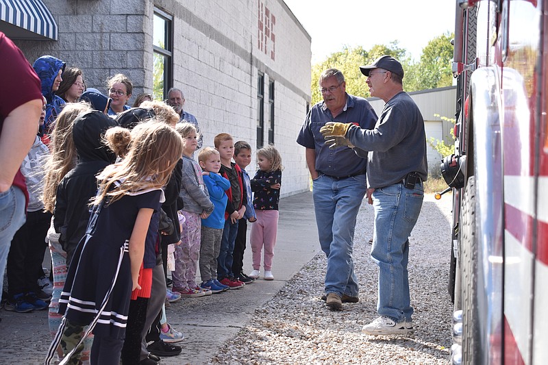 Democrat photo/Garrett Fuller — Deputy Fire Chief Cliff Maricle, right, of the Moreau Fire Protection District, explains the importance of fire safety Thursday (Oct. 13, 2022,) to students at High Point R-III School.