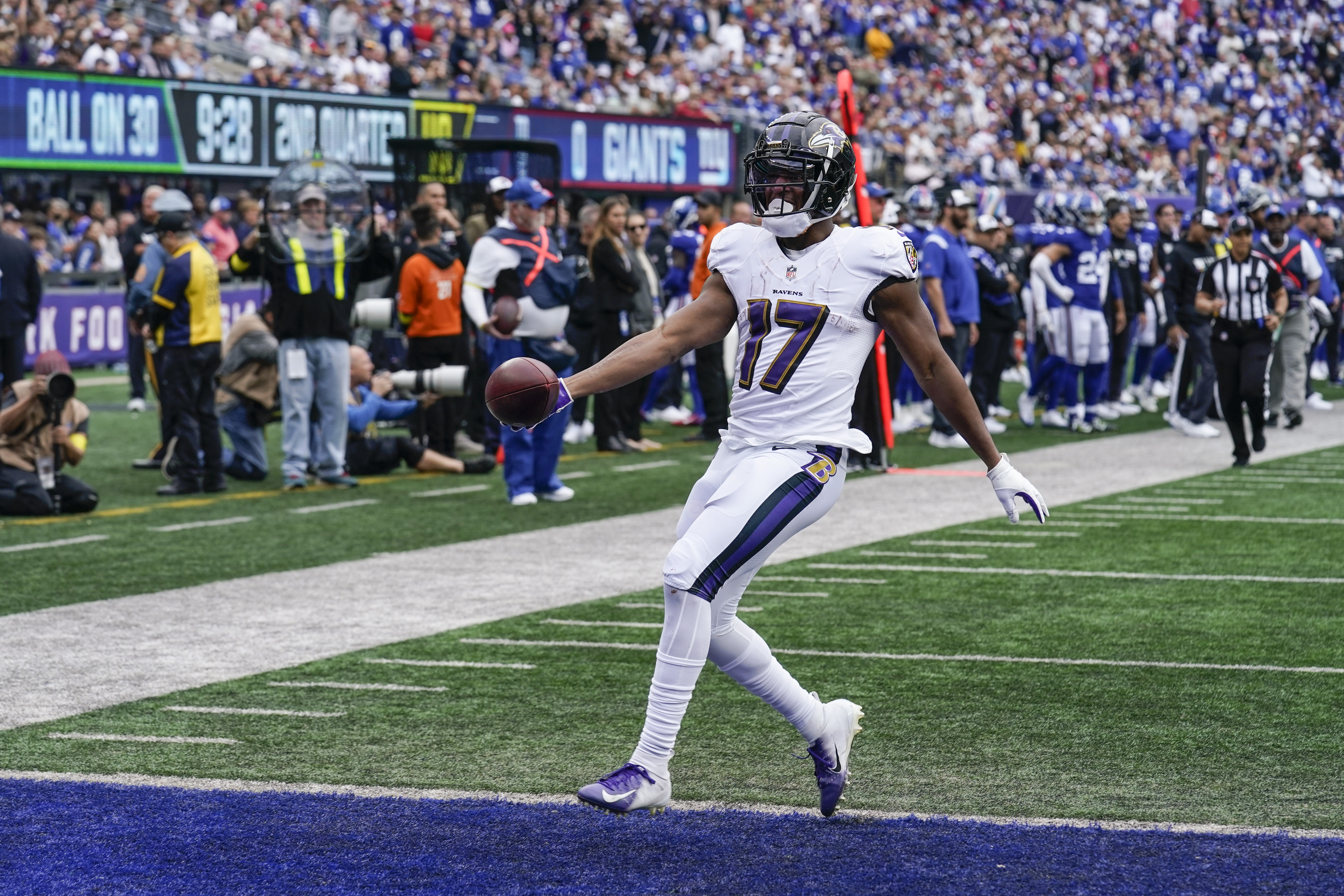 Baltimore Ravens running back J.K. Dobbins (27) runs with the ball against  the New York Giants during an NFL football game Sunday, Oct. 16, 2022, in  East Rutherford, N.J. (AP Photo/Adam Hunger