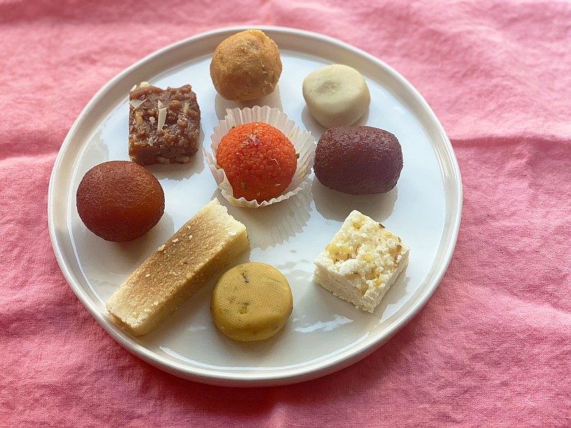 An assortment of sweets from an Indian food shop are displayed Oct. 19, 2022, in New York. These sweets are typically enjoyed on Diwali, the Hindu festival of lights. (Katie Workman via AP)