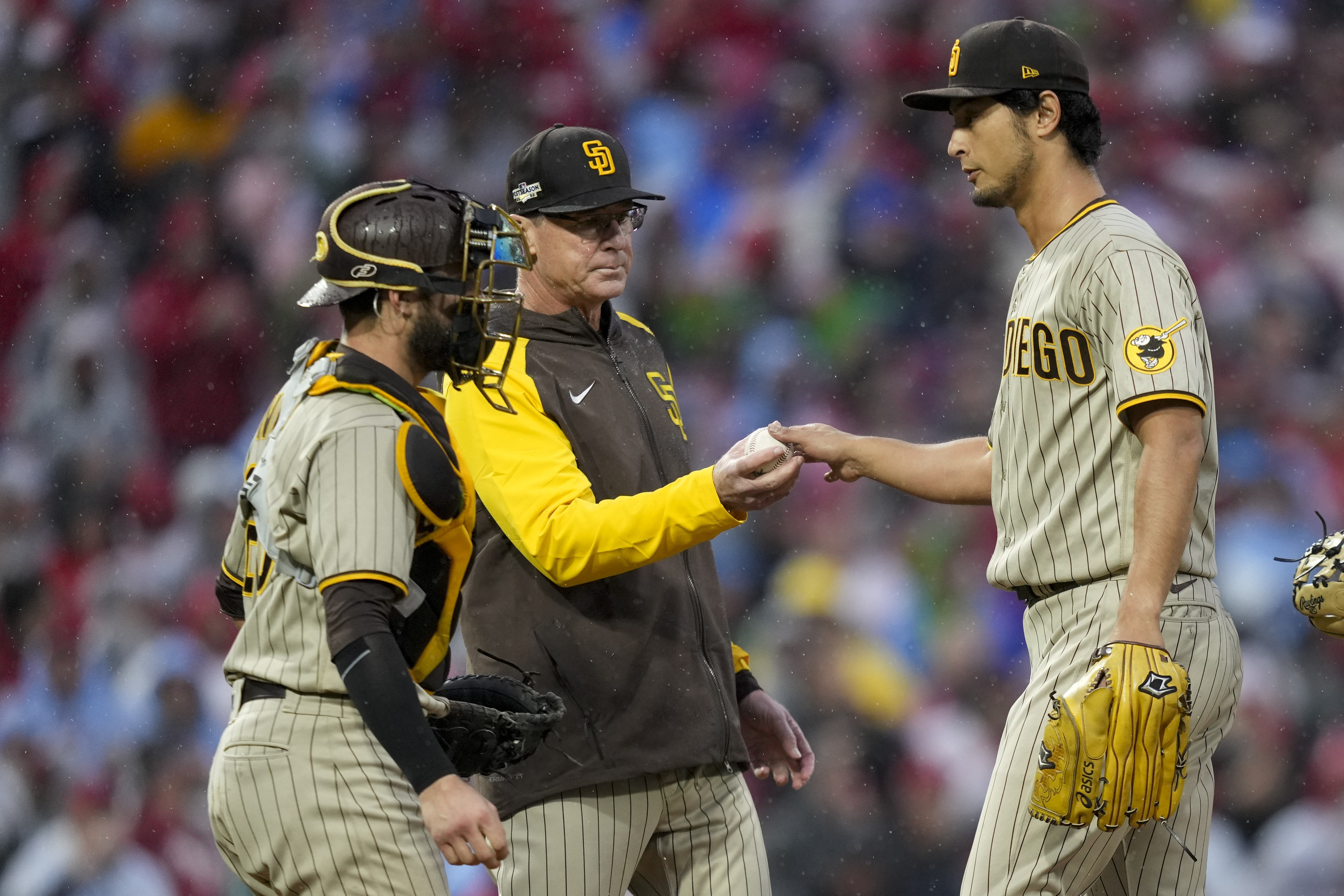 Philadelphia Phillies starting pitcher Ranger Suarez and catcher J.T.  Realmuto celebrate after winning the baseball NL Championship Series  against the San Diego Padres on Sunday, Oct. 23, 2022, in Philadelphia. (AP  Photo/Brynn