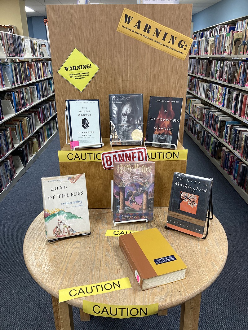 Democrat photo/Garrett Fuller — Banned books are seen displayed Oct. 19, 2022, at the Moniteau County Library at Wood Place. Missouri Secretary of State Jay Ashcroft announced a proposed administrative rule that affects "inappropriate" materials at state-funded libraries.