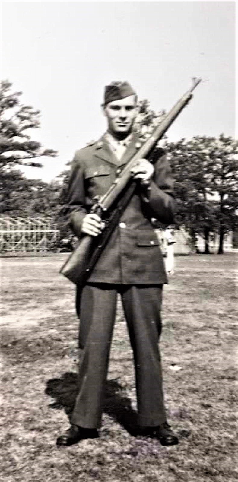 William Fancher is pictured in training with the U.S. Army during World War II. He later deployed to France, where he met Michel Schuer’s mother.
(Courtesy/Becky Landreth Henson)