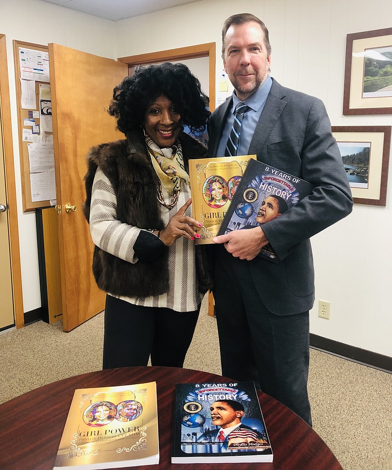 Author Phyllis Hodges, left, is pictured with El Dorado School District Superintendent Jim Tucker, following a meeting where they talked about her books, "Girl Power" and "8 Years of Unforgettable History." (Contributed)