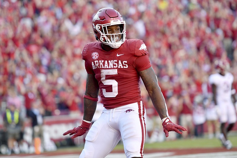 Arkansas running back Raheim Sanders (5) celebrates after a touchdown against Alabama Oct. 1 in Fayetteville. - Photo by Michael Woods of The Associated Press