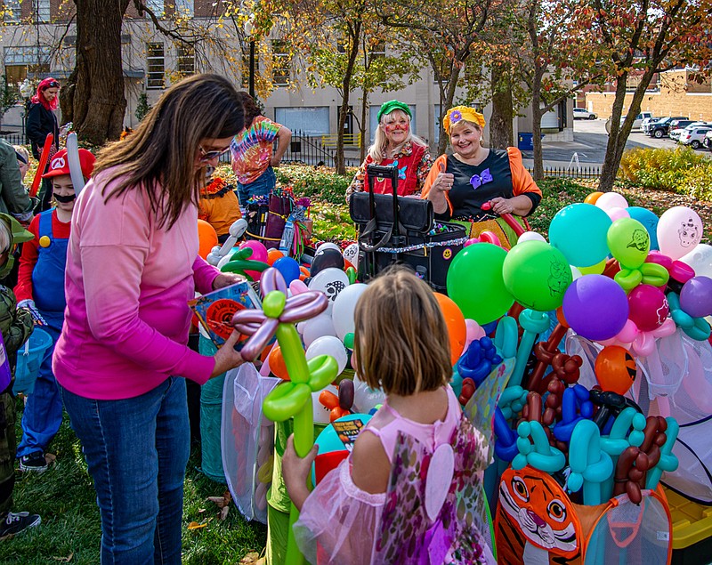 An abundance of balloons awaited guests at the Governor's Mansion Fall Festival Saturday.  (Ken Barnes/News Tribune)