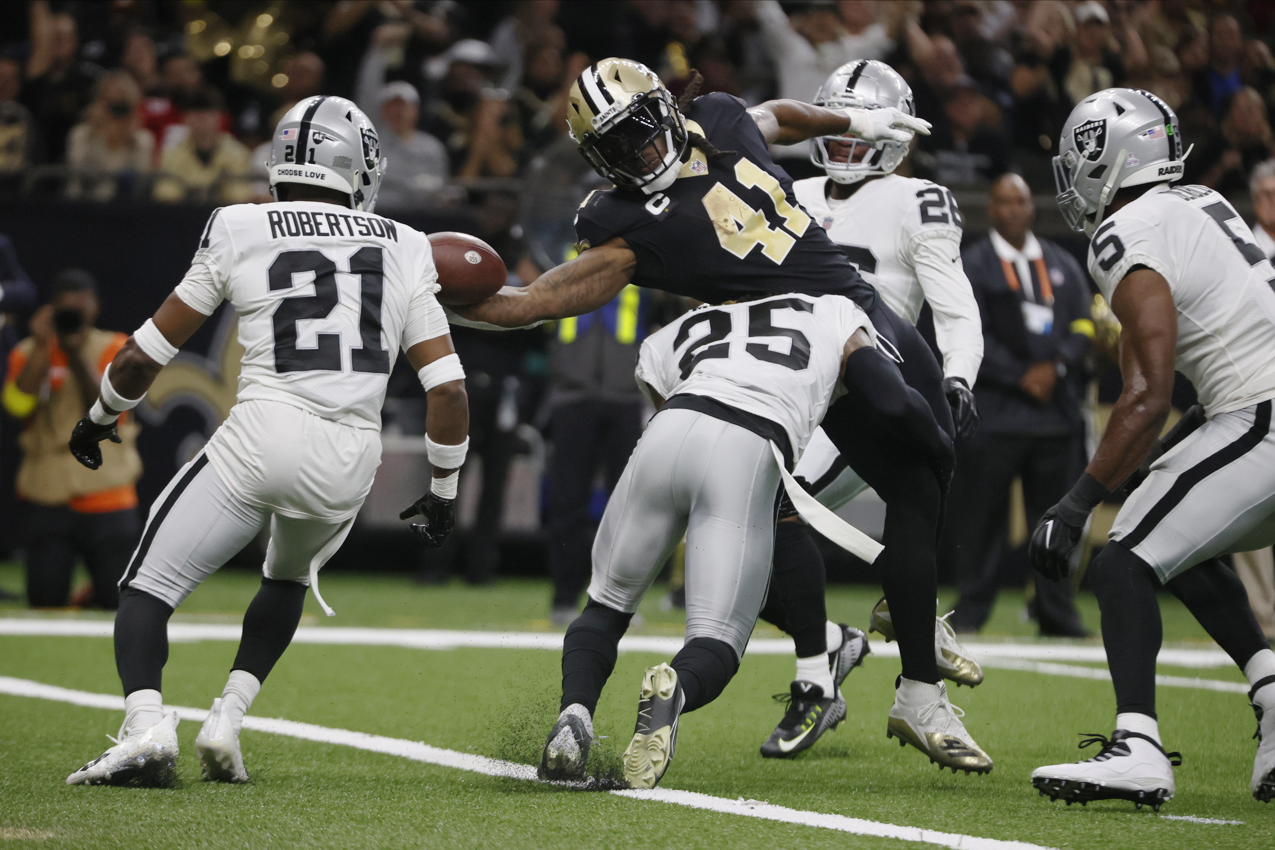 Saints ride Kamara's 3 TDs, defense to 24-0 win over Raiders