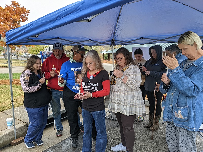 Ryan Pivoney/News Tribune photo:
About a dozen community members gather for a candlelight vigil celebrating the life of Darnell Gray Sunday, Oct. 30, 2022, at Washington Park in Jefferson City. Darnell, a 4-year-old boy, was killed in 2018. His caretaker is awaiting trial for charges connected to his death.