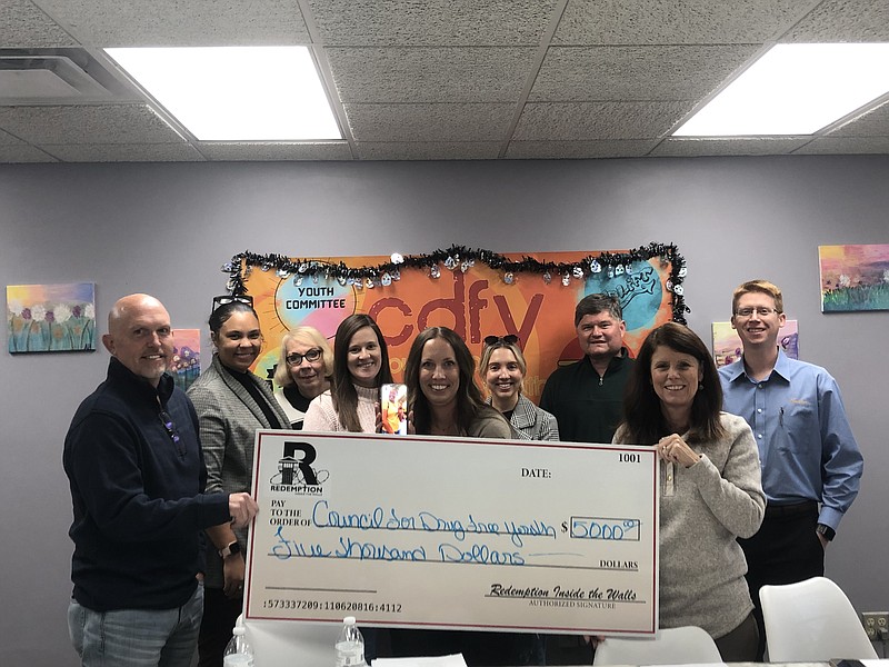 The Redemption Inside the Walls committee recently presented a $5,000 check to the Council for Drug Free Youth to help with its mission to "motivate, educate and collaborate to promote drug-free lifestyles among youth in Mid-Missouri." (Submitted photo)