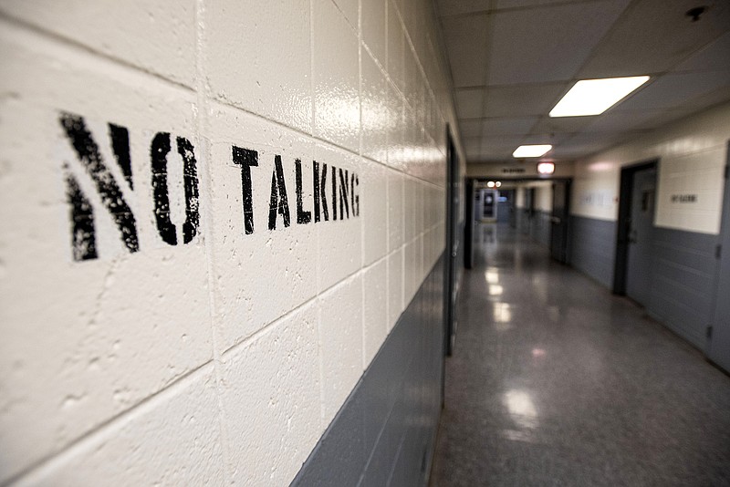 A hallway is seen on May 20  at the Sebastian County Detention Center in Fort Smith. The Sebastian County Quorum Court on Tuesday discussed recommended uses for the American Rescue Plan funds the county has been allocated, including an expansion of the county's mental health specialty court and the creation of a sobering center, measures that could help address the issue of crowding at the jail. Go to nwaonline.com/221106Daily/ for today's photo gallery.
(File Photo/River Valley Democrat-Gazette/Hank Layton)