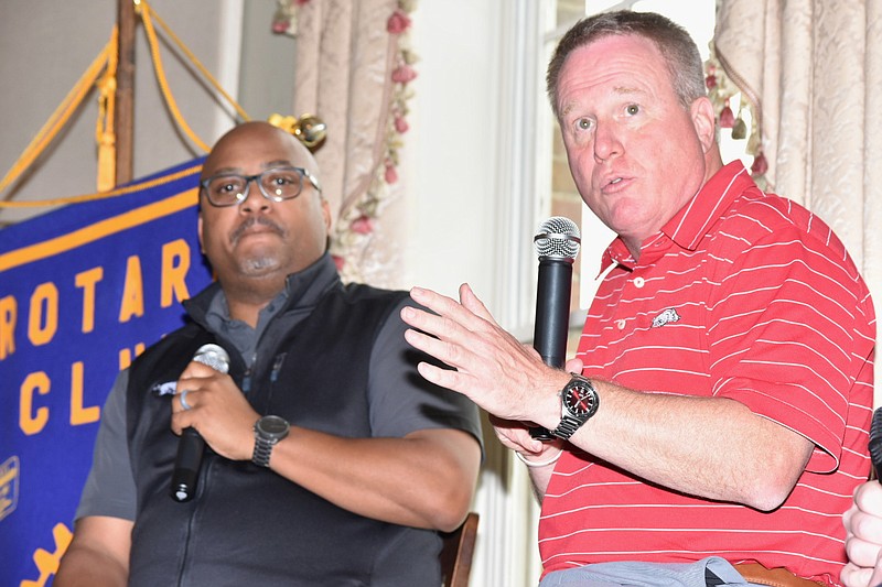 University of Arkansas color analysts Quinn Grovey and Matt Zimmerman speak to members and guests of the Pine Bluff Rotary Club and Razorback Foundation on Tuesday at the Pine Bluff Country Club. Grovey is a former Arkansas quarterback, and Zimmerman is a former Razorback men's basketball assistant coach. (Pine Bluff Commercial/I.C. Murrell)