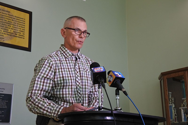 Brad Wiley, chief deputy for the Crawford County Sheriff’s Office, reads a statement Wednesday to the media at the Sheriff’s Office in Van Buren.

(NWA Democrat-Gazette/Thomas Saccente)
