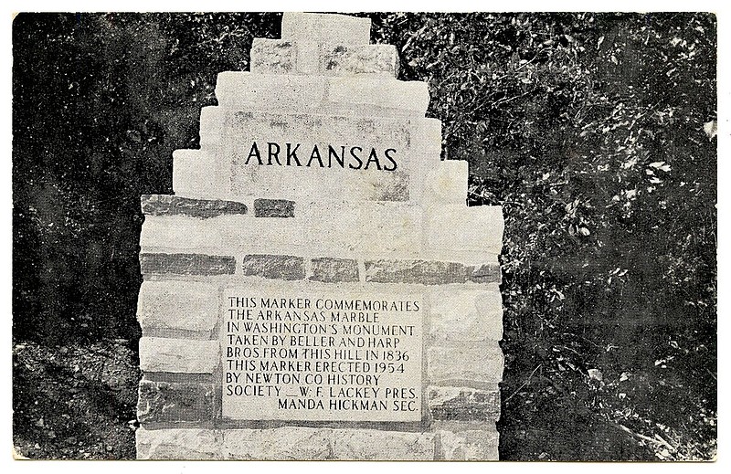 Newton County, circa 1955: Motorists speed by this marker on Arkansas 7 between Jasper and Harrison.