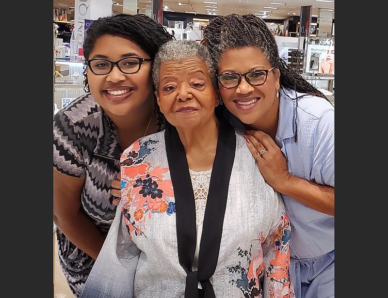 Little Rock Nine member Elizabeth Eckford (center) and “The Worst First Day” co-authors Grace Stanley and Eurydice Stanley enjoy a makeover at Dillard’s in preparation for Little Rock’s 65th-anniversary events, in September, commemorating the desegregation of Central High School. (Special to the Democrat-Gazette)