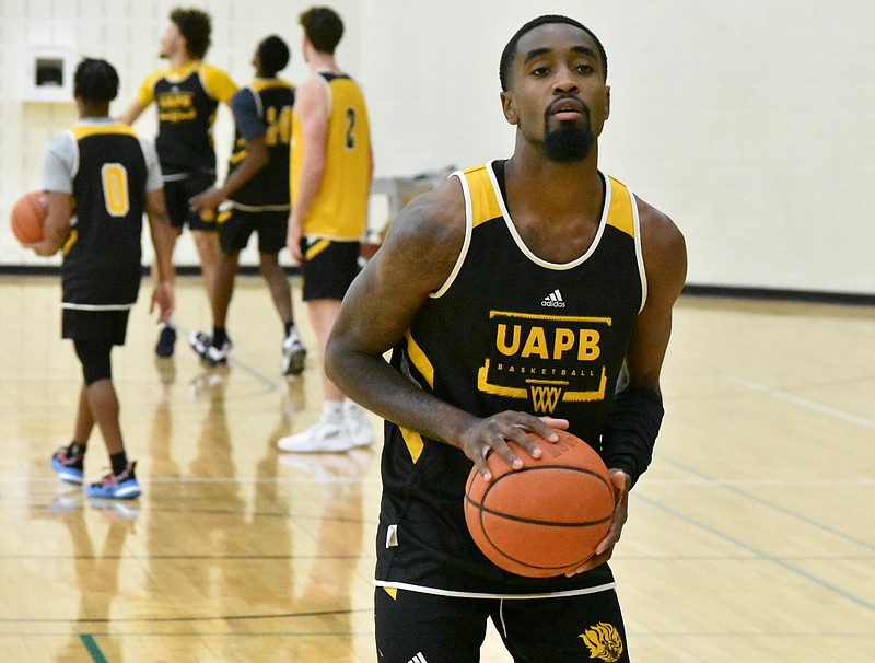 UAPB graduate student Shaun Doss Jr. practices free throws during practice Wednesday. (Pine Bluff Commercial/I.C. Murrell)