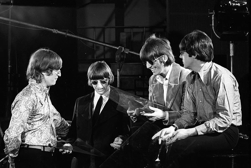 The Beatles — from left, John Lennon, Ringo Starr, George Harrison and Paul McCartney — at Abbey Road Studios during filming of the “Paperback Writer” and “Rain” promotional films in May 1966. (Courtesy of Apple Corps Ltd.)