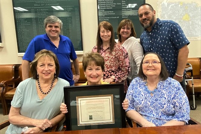 El Dorado Historic District Commission members display their 2022 “Commission of the Year” certificate. The EHDC was named the best historic district commission in the nation by the National Alliance of Preservation Commissions, who announced the win last July during its annual forum in Cincinatti. On the front row, from left, are EHDC commissioners Linda Rathbun and Diane Murfee and , EHDC executive director Elizabeth Eggleston. On the back row, from left, are commissioners Ken Bridges, Sara Coffman, Beth Callaway and Steve Biernacki. Commissioner Eric Wallace is not pictured. (Tia Lyons/News-Times)