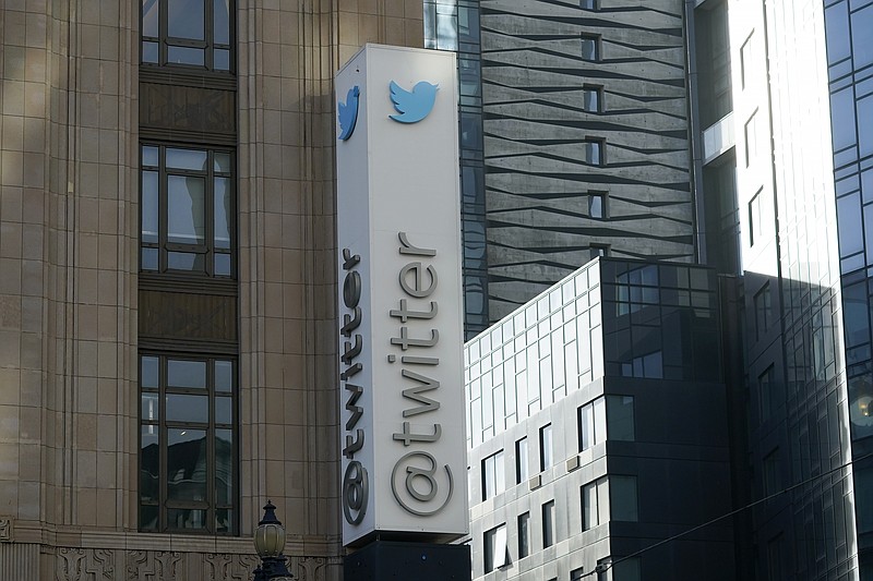 A Twitter headquarters sign is shown in San Francisco, Friday, Nov. 4, 2022. Employees were bracing for widespread layoffs at Twitter on Friday, as new owner Elon Musk overhauls the social platform. (AP Photo/Jeff Chiu)