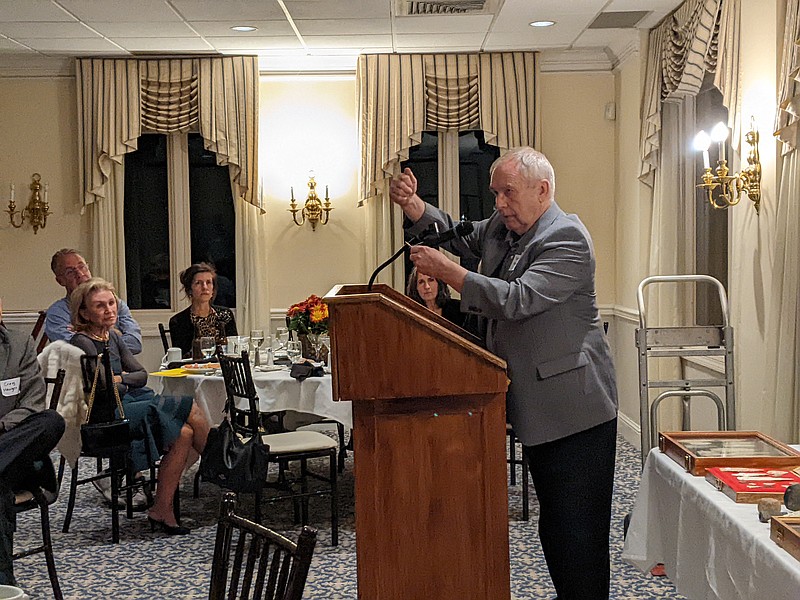 Ryan Pivoney/News Tribune photo: 
Terry Allen shows a couple Graham Cave points uncovered in Callaway County to the Cole County Historical Society Sunday night at its 81st annual dinner meeting. The points are part of Allen's personal collection of Native American artifacts, which he's been collecting since he was 13 years old.