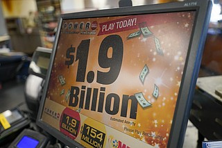 Q&A: A look at $1.9B Powerball jackpot, how it grew so large