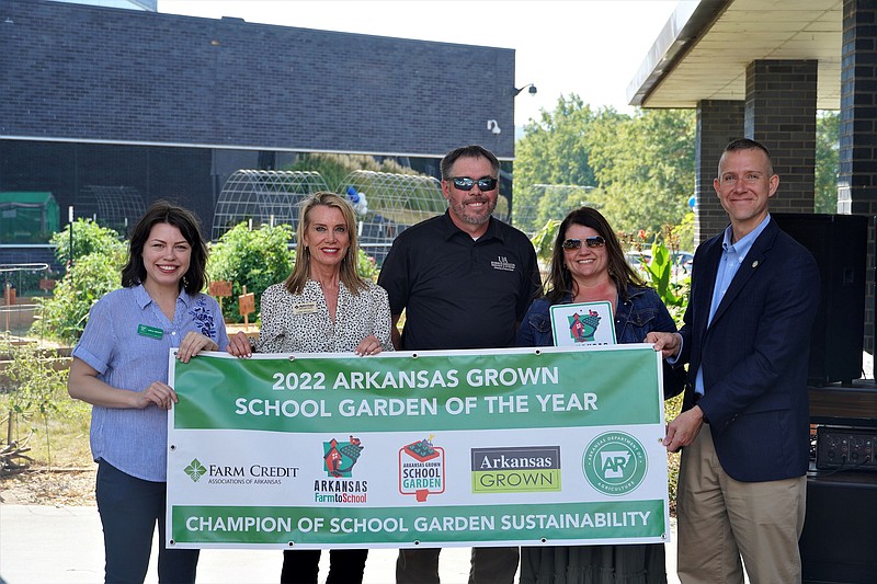 The Sheridan Elementary School presentation included Erica Benoit (left) with the Arkansas Department of Agriculture, Lana Stovall with AgHeritage Farm Credit Services, County Extension Staff Chair Brad McGinley, SES teacher Cindy Whitaker, and Arkansas Secretary of Agriculture Wes Ward. (Special to The Commercial)