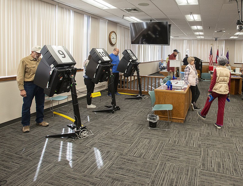 Voters cast their ballots Friday Oct. 28, 2022 while voting early at the Washington County Courthouse in Fayetteville. (NWA Democrat-Gazette/J.T. Wampler)