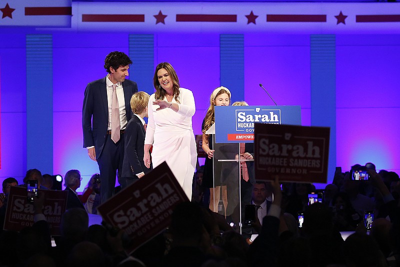 Governor-elect Sarah Huckabee Sanders and her family wave to supporters on Tuesday, Nov. 8, 2022, at the Statehouse Convention Center in Little Rock. (Arkansas Democrat-Gazette/Thomas Metthe)