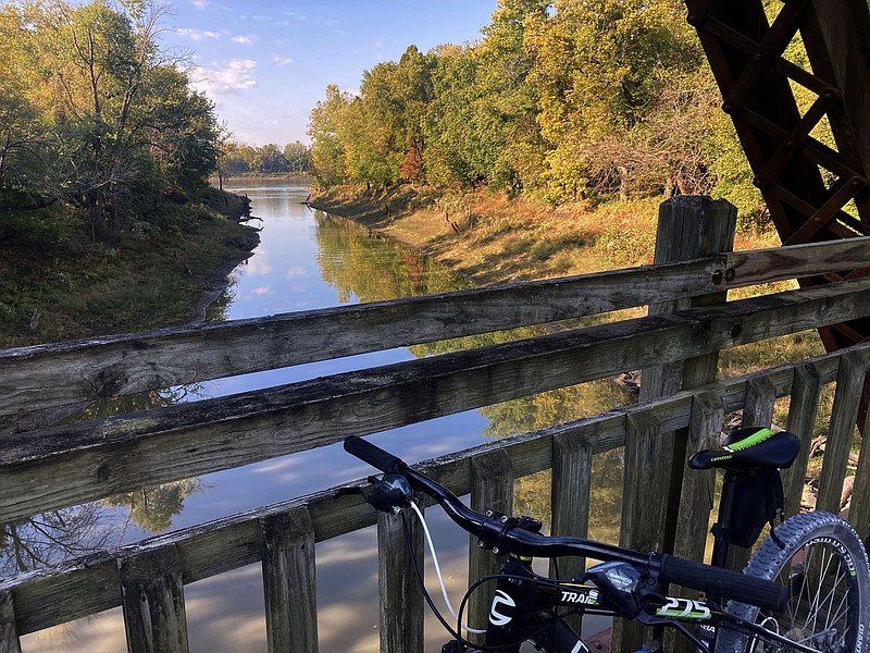 Cedar Creek flows under a bridge Oct. 10 2022 along the Katy Trail on the creek's way to join the Missouri River near Jefferson City, Mo. The rails to trails conversion bisects the heart of Missouri and is a top destination for cyclists from around the nation.
(NWA Democrat-Gazette/Flip Putthoff)