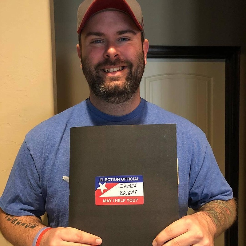 Texarkana Gazette General Manager James Bright receives his election official paperwork in 2018. (Photo by Chelsea Bright)