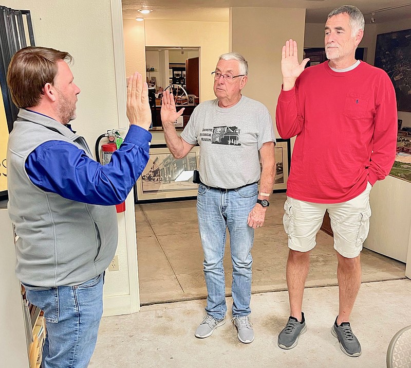 Submitted Photo/STEVE MITCHAEL
Mayor Kurt Maddox swears in Bob Kelley and Jay Mitchael for another term as members of the Gravette Historical Museum Commission at the commission's meeting Monday, Nov. 7. Openings exist on the museum commission. Interested persons may inquire at City Hall.