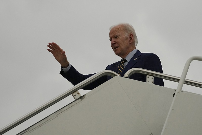 President Joe Biden waves as he boards Air Force One upon departure after attending the Association of Southeast Asian Nations (ASEAN) summit, Sunday, Nov. 13, 2022, in Phnom Penh, Cambodia. Biden is headed to the G20 summit in Nusa Due, on the island of Bali, Indonesia. (AP Photo/Alex Brandon)