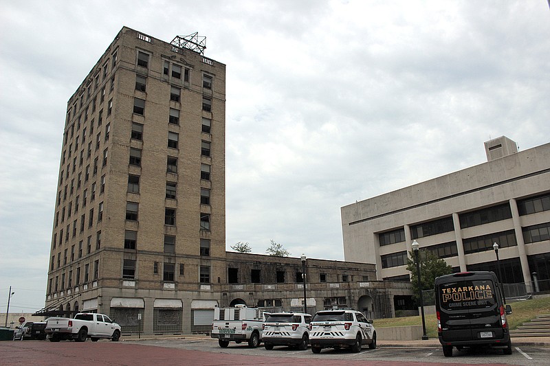 Hotel McCartney, left, is seen Friday, July 22, 2022, in downtown Texarkana, Texas. The vacant hotel at Front and Main streets is one building of eight the City Council targeted with property tax exemptions it approved Monday, Nov. 14, 2022. Redevelopers of the buildings can decrease their tax bills by 50% or 100% for a limited time. (File photo)